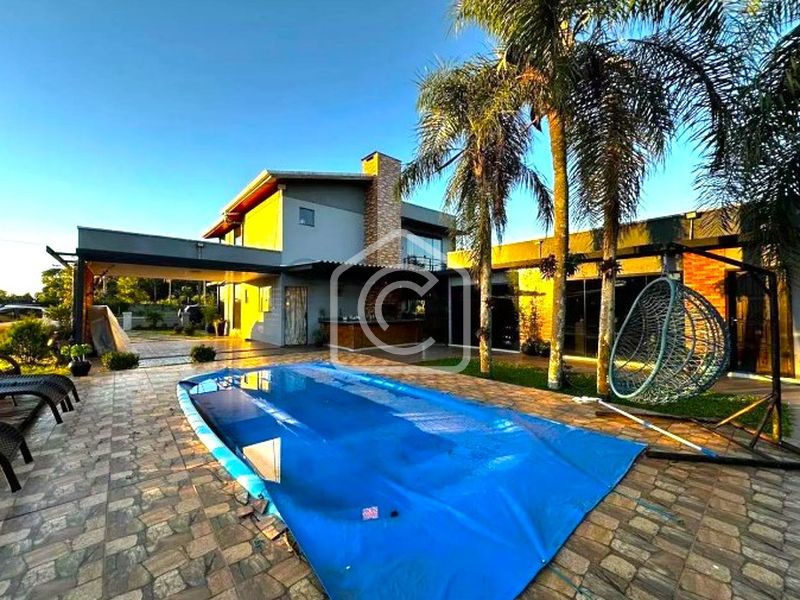 Casa para alugar com 3 dormitórios, 1 banheiro, 2 vagas de garagens e 300m² de área privativa no bairro Zona Rural